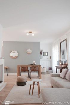 a living room filled with furniture and decor