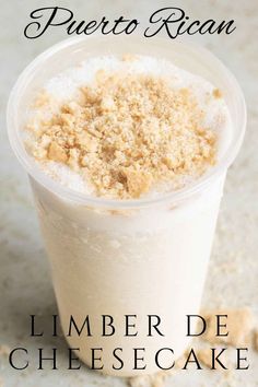 a dessert in a plastic cup with crumbs on the side and text overlay that reads, l'imber de cheesecake