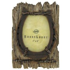 a wooden frame with rope around it and the words hobby lobby on it's side