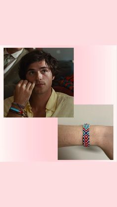 a man is wearing a bracelet on his wrist