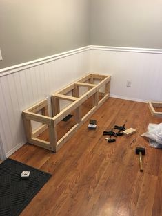 the room is being remodeled and ready to be used as a living area with wood flooring