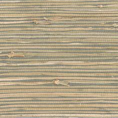 an area rug with blue and beige stripes on it, including two birds flying over the water