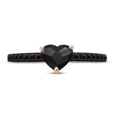 a heart shaped black diamond ring set in 18k rose gold with diamonds on the band