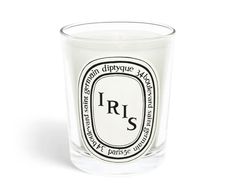 a glass candle with the words irs printed on it