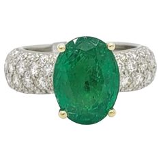 Gorgeous 4.64 ct. emerald oval with 0.60 ct. good quality white diamond rounds. Handmade in 18k yellow gold and platinum. Ring size 5.75. Platinum Ring, Cocktail Rings, Pave Diamonds, White Diamond, Turquoise Bracelet, Platinum, Emerald, Jewelry Rings, Ring Size