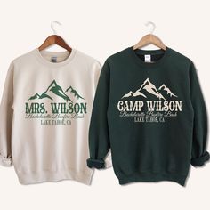 Get ready for an unforgettable camp bachelorette adventure with our custom sweatshirts! Embrace the party camping spirit at your lake bachelorette with our cozy bridesmaid shirts and bridal party tees. These campfire-themed shirts are the perfect addition to your rustic getaway, uniting your bride tribe in style as the wilderness crew. Whether you're by the lake or exploring the mountains, our girls trip shirts ensure you'll have a Lakefront Bash to remember. - 50% cotton, 50% polyester - Medium Camp Bachelorette Party Shirts, Camp Bachelorette Shirts, Camp Bride Bachelorette Parties, Camp Bachelorette Theme, Glamping Bachelorette, Camping Bachelorette Party, Lake Bachelorette, Camp Bachelorette Party, Camping Bachelorette