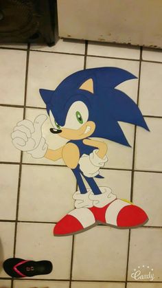 the sonic cartoon is on the tiled floor