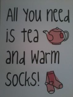 the words all you need is tea and warm socks are written in black on a white background