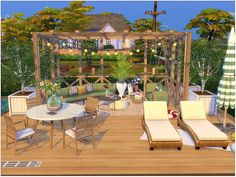 an outdoor living area with couches, tables and chairs