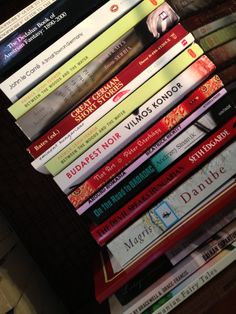 a stack of books sitting on top of each other