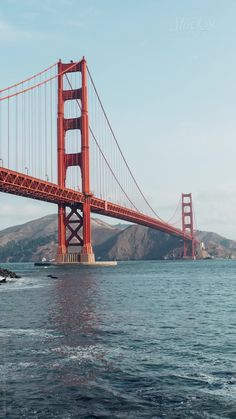 the golden gate bridge is seen from across the water