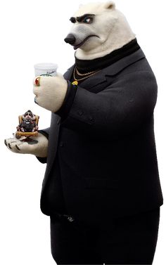 a man in a suit holding a cup and saucer with a bear on it