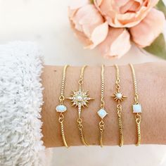 "DESCRIPTION: The DAINTY OPAL Bracelet Collection - dainty opal adjustable bolo bracelets. With a unique slide closure these bracelets are a one size fits most bracelet. Perfect on its own for a minimalist statement piece or the perfect addition to your favorite bracelet stack! MATERIALS: Chain, Gold plated Stones - Opals and CZ cubic zirconia stones set in gold plated PENDANT SIZE: Approximately Varies from 1/4-1\" in length PACKAGING: Your bracelet will arrive on a Dainty Doe signature jewelry Opal Bracelet Gold, Beachy Anklets, Silver Jewelry Cleaner, Best Friend Birthday Gift, Friend Birthday Gift, Moon Bracelet, Bolo Bracelet, White Jewelry Box, Sterling Silver Anklet