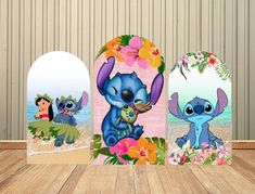 three disney characters are shown in front of a wooden table with flowers and an arch