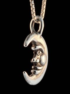 This smiling Moon Charm is cast in sterling silver. It is 7/8 inch high and fully detailed both front and back. All Marty Magic Charms and Pendants include an 18 inch (46cm) box chain. If you would prefer a different length of chain please feel free to contact me. This item usually ships the same or next business day. All Marty Magic Jewelry is packaged in a beautiful box, embossed with the gold foil Marty Magic dragon logo. Perfect for any occasion. Designed in Santa Cruz, California by Marty M Silver Moon Jewelry With Sun And Moon Design, Spiritual Silver Half Moon Jewelry, Celestial Silver Half Moon Jewelry, Silver Moon Shaped Symbolic Jewelry, Symbolic Silver Moon-shaped Jewelry, Crescent Silver Jewelry With Sun And Moon Design, Symbolic Silver Moon Jewelry, Symbolic Moon Shaped Silver Jewelry, Silver Jewelry With Sun And Moon Design