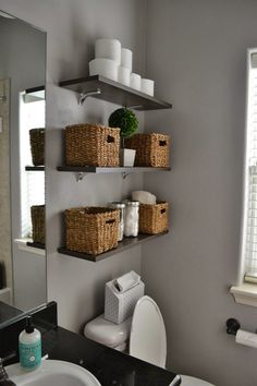 the bathroom is clean and ready to be used as a storage area for toiletries