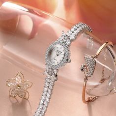 Description: 1.Unique design: This diamond ladies watch is carefully designed by the designer. 2.Case and strap: The diameter of the case is 0.83 inches, and the thickness of the dial is 0.31 inches. The strap has a width of 0.35 inches, which is suitable for women with a wrist circumference of 7.6 inches or less. 3.3ATM Life Waterproof: This women watch can withstand daily life waterproofing, such as: water splashes when washing hands (Please do not wash the watch under water) or raindrops when it rains. Be careful not to let the watch get damp, as the watch can last longer if it is in a dry state. Specifications: Water Resistance Depth: 3Bar Style: Simple Movement: Quartz Feature: Water Resistant Dial Material Type: Hardlex Dial Diameter: 21mm Clasp Type: hook Case Thickness: 8mm Case Sh Diamond Jewelry With Rectangular Dial For Evening, Evening Diamond Jewelry With Rectangular Dial, Timeless Diamond Bracelet Watch, Silver Watches With Rectangular Dial For Wedding, Silver Rectangular Dial Watches For Wedding, Diamond Bracelet Strap Jewelry And Watches For Formal Occasions, Elegant Watches With Diamond White Metal Dial, Formal Diamond Bracelet Strap Jewelry And Watches, Silver Wedding Watch With Rectangular Dial