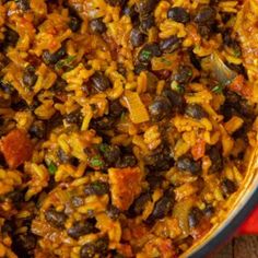 a large pot filled with rice and beans