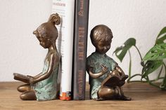 Boy and Girl Bookends Pair Wind Art, Rain Accessories, Handcrafted Decor, Art Desk, Boy And Girl, Garden Statues, Glass Decor, Holiday Collection, In A World