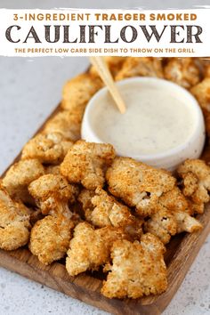 cauliflower on a cutting board with ranch dip in the middle and text overlay that reads, 3 ingredient trader smoked cauliflower