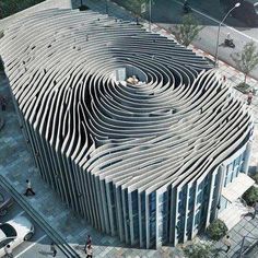 an aerial view of a building that is shaped like a spiral