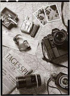 black and white photograph of various items on map