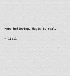 a white wall with the words keep believing magic is real