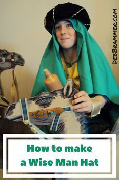 a woman in costume holding a horse statue with the words how to make a wise man hat