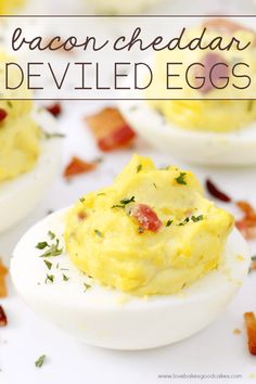 bacon and cheddar deviled eggs on a white plate with text overlay