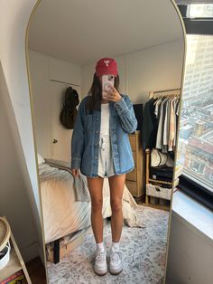 Denim shacket, jean jacket, grey sweatshorts, Phillies, casual outfit, fall transition, Reebok sneakers Jean Shacket Outfit, Denim Shacket Outfit, Grey Sweatshorts, Casual Outfit Fall, 2025 Style, Shacket Outfit, Denim Shacket, Edgy Looks, Baseball Outfit