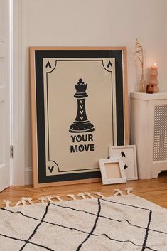 a black and white poster with a chess piece on it