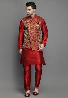 Art Silk Kurta in MaroonThis Readymade attire is Enhanced with Buttons. Crafted in Chinese Collar Neck and Full SleeveAvailable with an Art Silk Pajama in Maroon and an Art Brocade Silk Nehru Jacket in MaroonDo note: Brooch and Footwear shown in the image is for presentation purposes only. Half to one inch may vary in measurement. (Slight variation in actual color vs. image is possible) We sell all kinds of menswear. Mens Kurta | Mens Kurta Pajama | Mens Sherwani | Mens Sherwani Sets | Tradition Red Long Sleeve Nehru Jacket For Eid, Red Long Sleeve Nehru Jacket For Festivals, Festive Kurta With Dabka And Stand Collar, Long Sleeve Nehru Jacket With Dabka For Puja, Ceremonial Nehru Jacket For Diwali With Self Design, Semi-stitched Long Sleeve Sets For Puja, Long Sleeve Nehru Jacket For Festive Puja, Long Sleeve Sets For Navratri Puja, Bollywood Style Bandhgala With Self Design For Puja