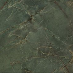 green marble textured with brown vein lines