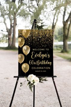 a welcome sign with gold balloons and confetti on it for an elegant celebration