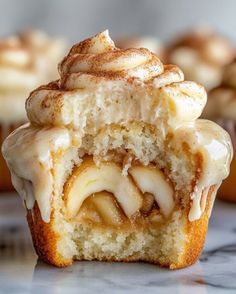 cinnamon roll cupcakes with icing on top