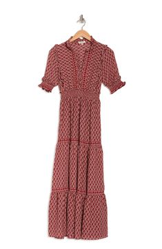 Add this smocked sleeve printed dress to your chic closet completing a stylish ensemble.Fit: this style fits true to size.- Split mock neck with ruffle detailing- Elbow length sleeves with smocked details- Smocked waist- Allover print- Tiered skirt- Maxi length- Approx. 53" length (size S)- Imported Machine wash cold 96% polyester, 4% spandex Spring Tiered Smock Maxi Dress, Smocked Sleeve, Chic Closet, Skirt Maxi, Tiered Maxi Dress, Ruffle Collar, Max Studio, Printed Dress, Elbow Length Sleeve