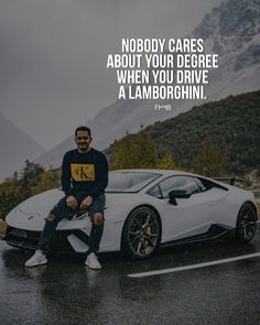 a man sitting on top of a white sports car in the rain with a quote about care