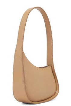 Find THE ROW Half Moon Bag on Editorialist. The Row Half Moon Bag is crafted from leather and features a top zipper closure, one main compartment, curved frame, and an integrated shoulder strap. It measures approximately 8 W x 5 H x 2.25 D with an 8.5 drop shoulder strap. The bag is made in Italy. The Row Half Moon Bag, Moon Bag, Half Moon, Chestnut, Drop Shoulder, The Row, Shoulder Strap, Moon, Italy