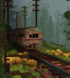 a train traveling through a forest filled with lots of green plants and trees next to power lines