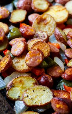 cooked sausage and vegetables on a plate ready to be eaten