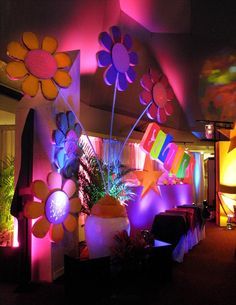 a room filled with lots of colorful lights and decorations