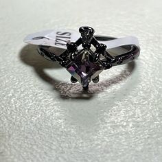 Fragrant Jewels Wizard Of Oz Ring Size 6!! Never Worn Just Sat In My Jewelry Box For Ages!!! Black Metal Crystal Promise Ring, Fragrant Jewels, 6 Rings, My Jewelry, Ring Color, Wizard Of Oz, Womens Jewelry Rings, Wizard, My Jewellery