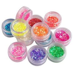 small jars filled with different colored glitters