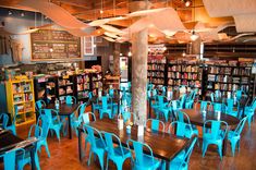 tables and chairs are lined up in the library