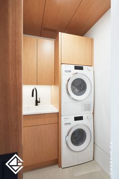 Cottage laundry room designed with recon rift white oak cabinetry. Oak Laundry Room, Basement Adu, Modern Cabin Bathroom, Custom Laundry Room Cabinets, Washer Dryer Closet, Laundry Room Utility Sink, Cottage Laundry, Laundry Room Stackable