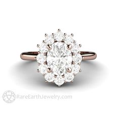 an oval cut diamond ring set in 18k rose gold