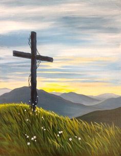 a painting of a cross on top of a hill with mountains in the back ground