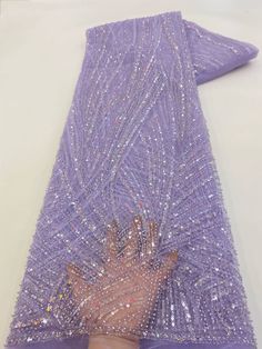 This high quality Fabric is measured in 5 Yards With Embroidered Beading and Sequin. It is soft, very delicate and beautiful. This high Quality Fabric is made with Fashion embroidered rhinestones can be used in making party wedding dresses, skirts, shawls, scarves and other other fashion apparels as you would like. Size : Length : 5 yards (180 inch). Width: 50 inch (Please allow slight deviation for the measurement data ,±1 inch) Material: 100% Polyester, Tulle Lace Fabric, Eco-Friendly embroide Sewing Wedding Dress, Beaded Lace Fabric, Nigerian Lace, Blue Party Dress, Beaded Tulle, Luxury Fabric, Bridal Fabric, African Lace, Handmade Fabric