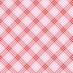 a pink and red plaid fabric with white squares on it, as well as a ruler