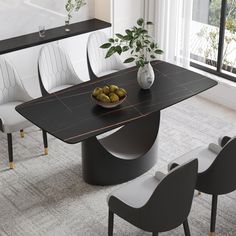 a dining room table with chairs and a bowl of olives on the centerpiece